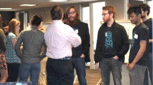 The Windrush team (L-R: Max Walker, Riley Alsman, Mark Morrison) talk to Flashstarts interns in 2015